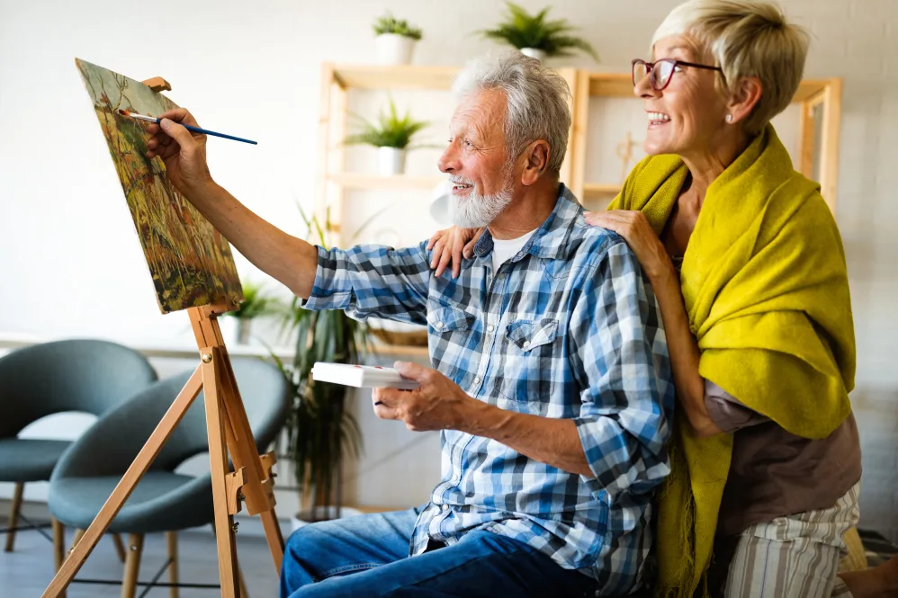 Senior couple painting