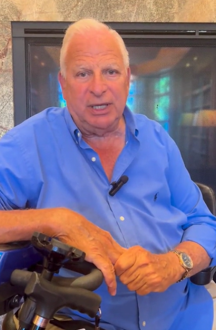 Senior man in blue button down shirt