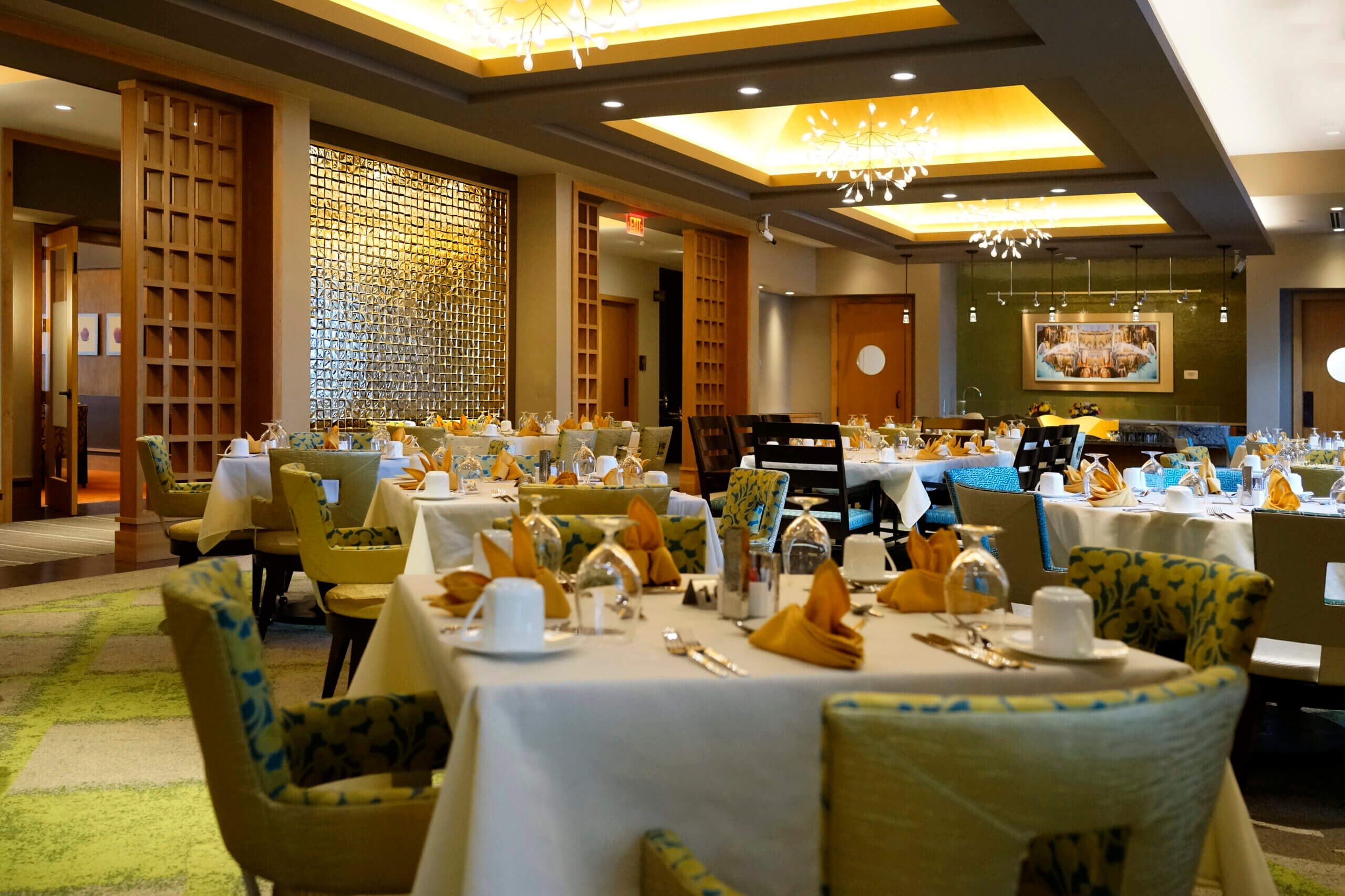 Dining room at All Seasons Birmingham featuring white table cloths